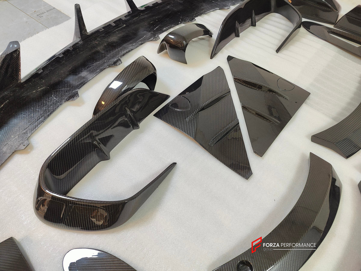 DRY CARBON BODY KIT for Aston Martin DBX AM8 2020 - 2024
Set includes:

Front Lip
Front Canards
Hood Air Vents
Side Mirrors
Side Fenders
Side Air Vents
Side Skirts
Rear Bumper
Rear Spoiler Wing
Exhaust System
Exhaust Tips
Material: Dry Carbon

NOTE: Professional installation is required.