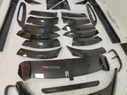 DRY CARBON BODY KIT for Aston Martin DBX AM8 2020 - 2024
Set includes:

Front Lip
Front Canards
Hood Air Vents
Side Mirrors
Side Fenders
Side Air Vents
Side Skirts
Rear Bumper
Rear Spoiler Wing
Exhaust System
Exhaust Tips
Material: Dry Carbon

NOTE: Professional installation is required.