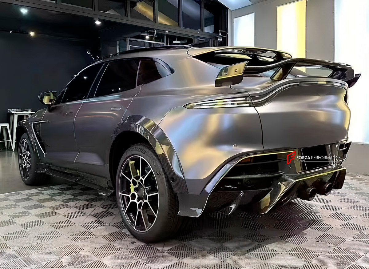 DRY CARBON BODY KIT for Aston Martin DBX AM8 2020 - 2024
Set includes:

Front Lip
Front Canards
Hood Air Vents
Side Mirrors
Side Fenders
Side Air Vents
Side Skirts
Rear Bumper
Rear Spoiler Wing
Exhaust System
Exhaust Tips
Material: Dry Carbon

NOTE: Professional installation is required.