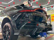 DRY CARBON BODY KIT for Aston Martin DBX AM8 2020 - 2024
Set includes:

Front Lip
Front Canards
Hood Air Vents
Side Mirrors
Side Fenders
Side Air Vents
Side Skirts
Rear Bumper
Rear Spoiler Wing
Exhaust System
Exhaust Tips
Material: Dry Carbon

NOTE: Professional installation is required.