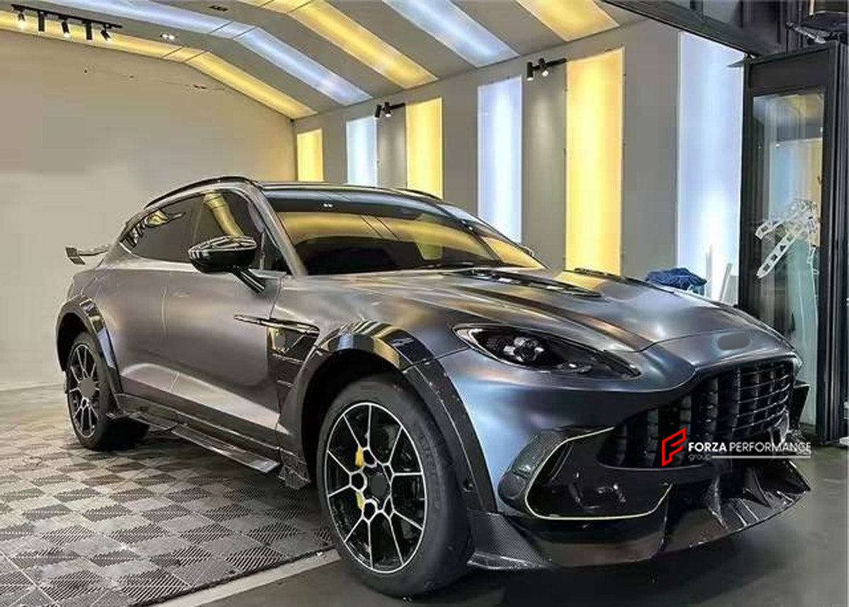 DRY CARBON BODY KIT for ASTON MARTIN DBX AM8 2020 - 2024 FORZA PERFORMANCE custom fit MS Style

Set includes:
Front Lip
Front Bumper Air Vent Covers
Hood Bonnet Air Vents
Side Fender Vents
Fender Flares
Side Mirror Covers
Body Side Door Moldings
Side Skirts
Roof Spoiler
Rear Spoiler Wing
Rear Diffuser

Material: Dry Carbon

NOTE: Professional installation is required.