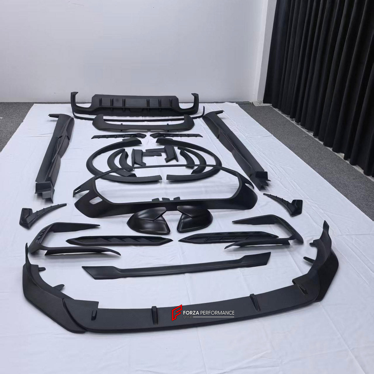 DRY CARBON BODY KIT for AUDI RS Q8 4M 2024+ FORZA PERFORMANCE custom fit ABT
Set includes:

Front Lip
Front Splitter
Front Bumper Fins
Front Fenders
Front Fender Vents
Side Mirror Covers
Side Skirts
Rear Fenders
Ducktail Spoiler
Rear Bumper Fins
Rear Diffuser
Material: Dry Carbon

NOTE: Professional installation is required.