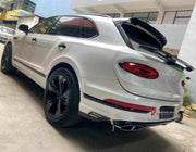 DRY CARBON BODY KIT for Bentley Bentayga 2020+
Set includes:

Front Lip
Side Mirror Cover
Rear Spoiler Wing
Rear Diffuser
Rear Bumper Fins
Material: Dry Carbon

NOTE: Professional installation is required.