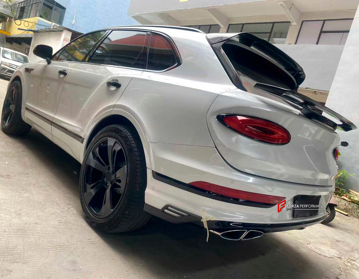 DRY CARBON BODY KIT for Bentley Bentayga 2020+
Set includes:

Front Lip
Side Mirror Cover
Rear Spoiler Wing
Rear Diffuser
Rear Bumper Fins
Material: Dry Carbon

NOTE: Professional installation is required.