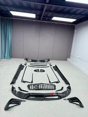 DRY CARBON BODY KIT for BENTLEY CONTINENTAL GT 2024+
Set includes:

Front Lip
Front Grille
Side Skirts
Front Bumper Air Intake Trims
Front Canards
Side Canards
Rear Diffuser
Mirror Covers
Rear Spoiler
Material: Dry Carbon

NOTE: Professional installation is required.
