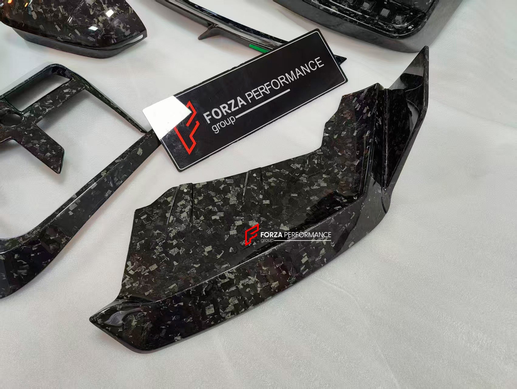 DRY CARBON BODY KIT for BMW 7 SERIES G70 2022+

Set includes:

Front Lip
Front Bumper Trims
Front Bumper Air Vent Covers
Side Mirror Covers
Side Trims
Side Skirts
Roof Spoiler
Rear Spoiler
Rear Diffuser

Material: Dry Carbon

Note: Professional installation is required. If you have 760i you don't need to change the bumpers