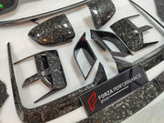 DRY CARBON BODY KIT for BMW 7 SERIES G70 2022+

Set includes:

Front Lip
Front Bumper Trims
Front Bumper Air Vent Covers
Side Mirror Covers
Side Trims
Side Skirts
Roof Spoiler
Rear Spoiler
Rear Diffuser

Material: Dry Carbon

Note: Professional installation is required. If you have 760i you don't need to change the bumpers