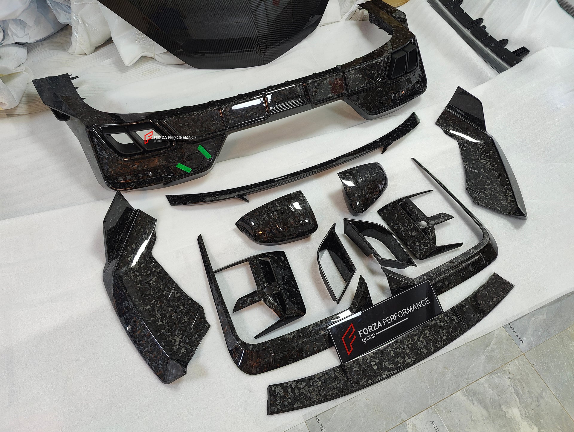 DRY CARBON BODY KIT for BMW 7 SERIES G70 2022+

Set includes:

Front Lip
Front Bumper Trims
Front Bumper Air Vent Covers
Side Mirror Covers
Side Trims
Side Skirts
Roof Spoiler
Rear Spoiler
Rear Diffuser

Material: Dry Carbon

Note: Professional installation is required. If you have 760i you don't need to change the bumpers