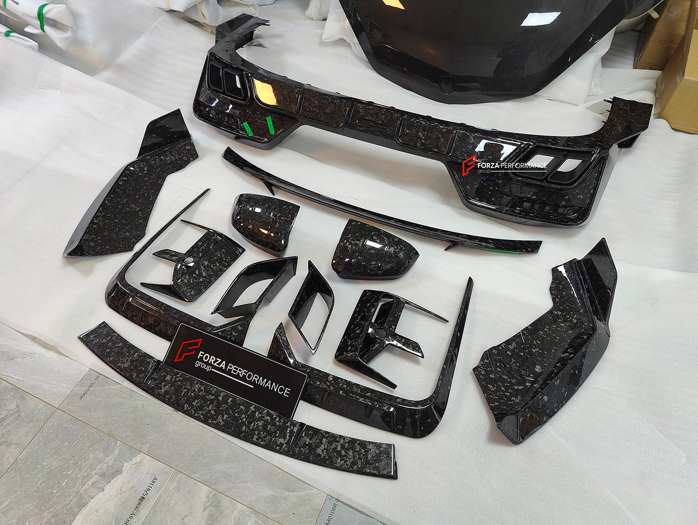DRY CARBON BODY KIT for BMW 7 SERIES G70 2022+

Set includes:

Front Lip
Front Bumper Trims
Front Bumper Air Vent Covers
Side Mirror Covers
Side Trims
Side Skirts
Roof Spoiler
Rear Spoiler
Rear Diffuser

Material: Dry Carbon

Note: Professional installation is required. If you have 760i you don't need to change the bumpers