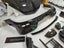 DRY CARBON BODY KIT for BMW 7 SERIES G70 2022+

Set includes:

Front Lip
Front Bumper Trims
Front Bumper Air Vent Covers
Side Mirror Covers
Side Trims
Side Skirts
Roof Spoiler
Rear Spoiler
Rear Diffuser

Material: Dry Carbon

Note: Professional installation is required. If you have 760i you don't need to change the bumpers