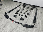 DRY CARBON BODY KIT for BMW 7 SERIES G70 2022+ FORZA PERFORMANCE custom fit Mansory Style

Set includes:
Front Lip
Front Bumper Canards
Front Bumper Air Vent Covers
Side Mirror Covers
Side Skirts
Roof Spoiler
Ducktail Spoiler
Rear Bumper Fins
Rear Diffuser
Exhaust Tips

Material: Dry Carbon, Carbon

NOTE: Professional installation is required.