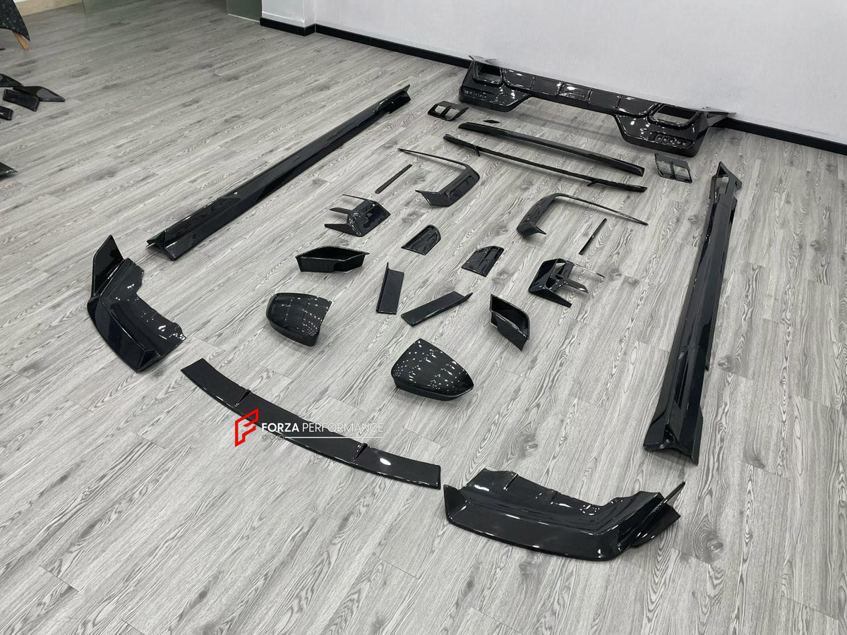 DRY CARBON BODY KIT for BMW 7 SERIES G70 2022+ FORZA PERFORMANCE custom fit Mansory Style

Set includes:
Front Lip
Front Bumper Canards
Front Bumper Air Vent Covers
Side Mirror Covers
Side Skirts
Roof Spoiler
Ducktail Spoiler
Rear Bumper Fins
Rear Diffuser
Exhaust Tips

Material: Dry Carbon, Carbon

NOTE: Professional installation is required.