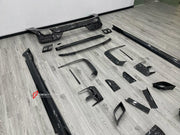 DRY CARBON BODY KIT for BMW 7 SERIES G70 2022+ FORZA PERFORMANCE custom fit Mansory Style

Set includes:
Front Lip
Front Bumper Canards
Front Bumper Air Vent Covers
Side Mirror Covers
Side Skirts
Roof Spoiler
Ducktail Spoiler
Rear Bumper Fins
Rear Diffuser
Exhaust Tips

Material: Dry Carbon, Carbon

NOTE: Professional installation is required.