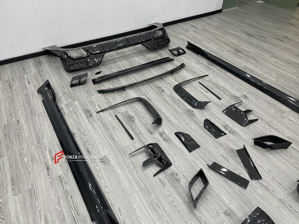 DRY CARBON BODY KIT for BMW 7 SERIES G70 2022+ FORZA PERFORMANCE custom fit Mansory Style

Set includes:
Front Lip
Front Bumper Canards
Front Bumper Air Vent Covers
Side Mirror Covers
Side Skirts
Roof Spoiler
Ducktail Spoiler
Rear Bumper Fins
Rear Diffuser
Exhaust Tips

Material: Dry Carbon, Carbon

NOTE: Professional installation is required.