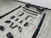 DRY CARBON BODY KIT for BMW 7 SERIES G70 2022+ FORZA PERFORMANCE custom fit Mansory Style

Set includes:
Front Lip
Front Bumper Canards
Front Bumper Air Vent Covers
Side Mirror Covers
Side Skirts
Roof Spoiler
Ducktail Spoiler
Rear Bumper Fins
Rear Diffuser
Exhaust Tips

Material: Dry Carbon, Carbon

NOTE: Professional installation is required.