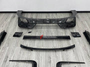 DRY CARBON BODY KIT for BMW 7 SERIES G70 2022+ FORZA PERFORMANCE custom fit Mansory Style

Set includes:
Front Lip
Front Bumper Canards
Front Bumper Air Vent Covers
Side Mirror Covers
Side Skirts
Roof Spoiler
Ducktail Spoiler
Rear Bumper Fins
Rear Diffuser
Exhaust Tips

Material: Dry Carbon, Carbon

NOTE: Professional installation is required.