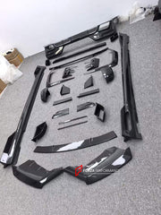 DRY CARBON BODY KIT for BMW 7 SERIES G70 2022+ FORZA PERFORMANCE custom fit Mansory Style

Set includes:
Front Lip
Front Bumper Canards
Front Bumper Air Vent Covers
Side Mirror Covers
Side Skirts
Roof Spoiler
Ducktail Spoiler
Rear Bumper Fins
Rear Diffuser

Material: Dry Carbon, Carbon

NOTE: Professional installation is required.