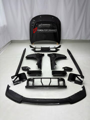 DRY CARBON BODY KIT for BMW M2 G87 2023+

Set includes:
Front Lip
Front Grille
Hood Bonnet
Front Fenders
Side Mirror Covers
Side Skirts
Rear Spoiler Wing
Rear Diffuser

Material: Dry Carbon

NOTE: Professional installation is required.