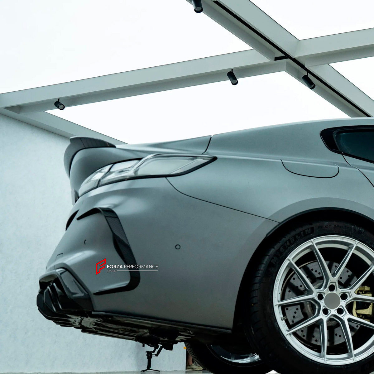 DRY CARBON BODY KIT for BMW M8 F91 F92 F93 2019+ FORZA PERFORMANCE custom fit Aulena
Set includes:

Front Lip
Front Bumper Air Vents
Front Bumper Canards
Side Skirts
Ducktail Spoiler
Rear Spoiler Wing
Rear Bumper Canards
Rear Diffuser
Material: Dry Carbon

NOTE: Professional installation is required.