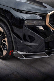 DRY CARBON BODY KIT for BMW XM G09 2023+

Set includes:
Front Lip
Front Bumper Canards
Side Skirts
Roof Spoiler
Ducktail Spoiler
Rear Bumper Fins
Rear Diffuser

Material: Dry Carbon

NOTE: Professional installation is required.