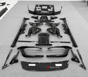 DRY CARBON BODY KIT for Ferrari 12Cilindri 2024+
Set includes:

Front Lip
Front Bumper Fins
Engine Cover Lid
Door Sill Covers
Side Skirts
Ducktail Spoiler
Rear Diffuser
Material: Dry Carbon

NOTE: Professional installation is required.