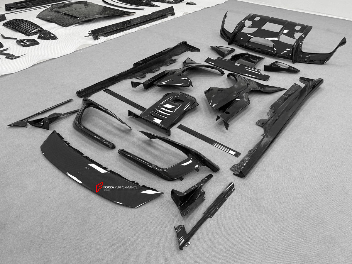 DRY CARBON BODY KIT for Ferrari 12Cilindri 2024+
Set includes:

Front Lip
Front Bumper Fins
Engine Cover Lid
Door Sill Covers
Side Skirts
Ducktail Spoiler
Rear Diffuser
Material: Dry Carbon

NOTE: Professional installation is required.