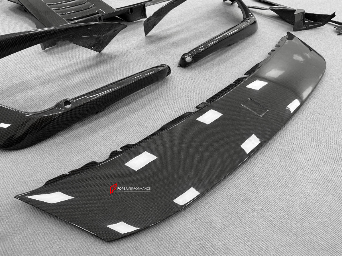 DRY CARBON BODY KIT for Ferrari 12Cilindri 2024+
Set includes:

Front Lip
Front Bumper Fins
Engine Cover Lid
Door Sill Covers
Side Skirts
Ducktail Spoiler
Rear Diffuser
Material: Dry Carbon

NOTE: Professional installation is required.