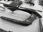 DRY CARBON BODY KIT for Ferrari 12Cilindri 2024+
Set includes:

Front Lip
Front Bumper Fins
Engine Cover Lid
Door Sill Covers
Side Skirts
Ducktail Spoiler
Rear Diffuser
Material: Dry Carbon

NOTE: Professional installation is required.