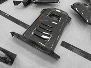 DRY CARBON BODY KIT for Ferrari 12Cilindri 2024+
Set includes:

Front Lip
Front Bumper Fins
Engine Cover Lid
Door Sill Covers
Side Skirts
Ducktail Spoiler
Rear Diffuser
Material: Dry Carbon

NOTE: Professional installation is required.
