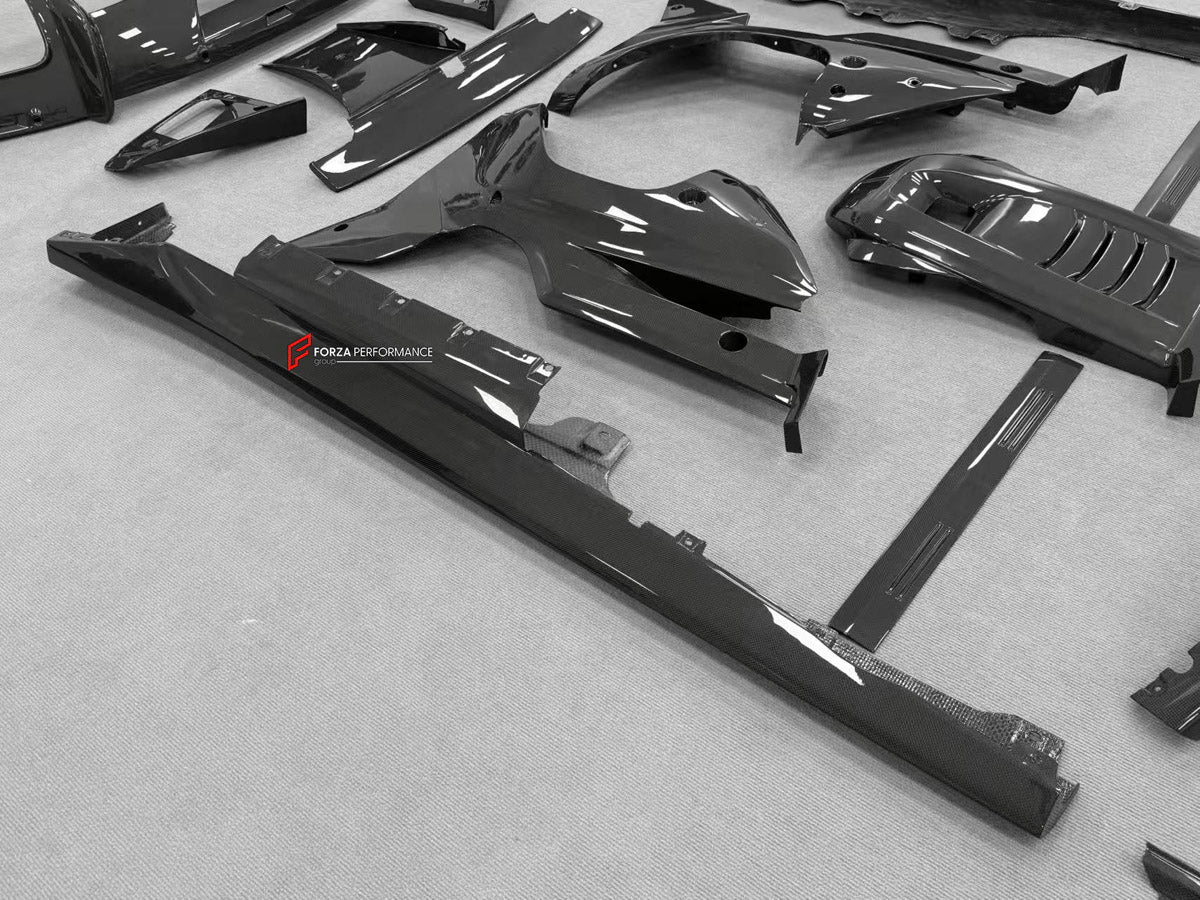 DRY CARBON BODY KIT for Ferrari 12Cilindri 2024+
Set includes:

Front Lip
Front Bumper Fins
Engine Cover Lid
Door Sill Covers
Side Skirts
Ducktail Spoiler
Rear Diffuser
Material: Dry Carbon

NOTE: Professional installation is required.