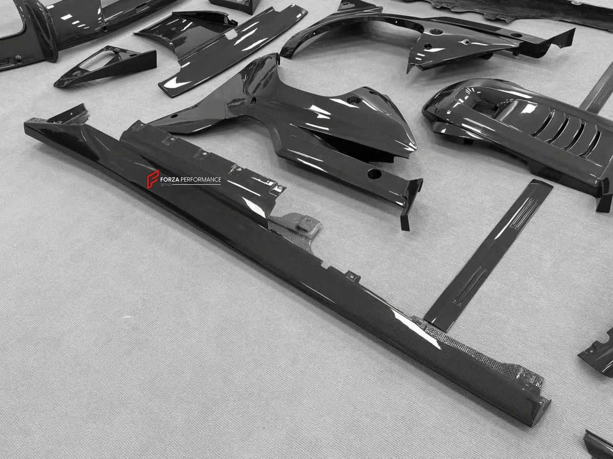 DRY CARBON BODY KIT for Ferrari 12Cilindri 2024+
Set includes:

Front Lip
Front Bumper Fins
Engine Cover Lid
Door Sill Covers
Side Skirts
Ducktail Spoiler
Rear Diffuser
Material: Dry Carbon

NOTE: Professional installation is required.