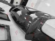 DRY CARBON BODY KIT for Ferrari 12Cilindri 2024+
Set includes:

Front Lip
Front Bumper Fins
Engine Cover Lid
Door Sill Covers
Side Skirts
Ducktail Spoiler
Rear Diffuser
Material: Dry Carbon

NOTE: Professional installation is required.