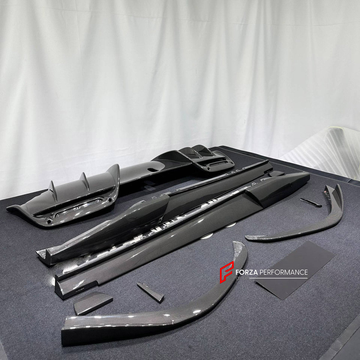 DRY CARBON BODY KIT for FERRARI 296 GTB GTS 2022+

Set includes:
Front Lip Splitter
Side Skirts
Rear Diffuser

Material: Dry Carbon

NOTE: Professional installation is required.