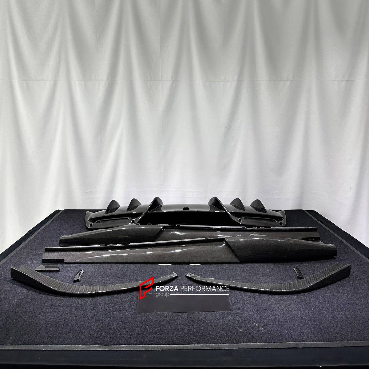 DRY CARBON BODY KIT for FERRARI 296 GTB GTS 2022+

Set includes:
Front Lip Splitter
Side Skirts
Rear Diffuser

Material: Dry Carbon

NOTE: Professional installation is required.