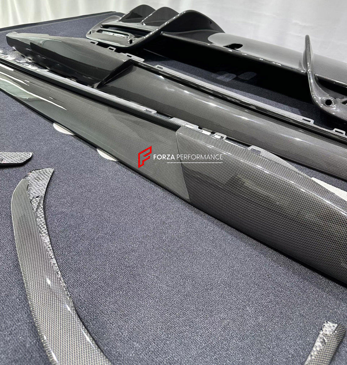 DRY CARBON BODY KIT for FERRARI 296 GTB GTS 2022+

Set includes:
Front Lip Splitter
Side Skirts
Rear Diffuser

Material: Dry Carbon

NOTE: Professional installation is required.