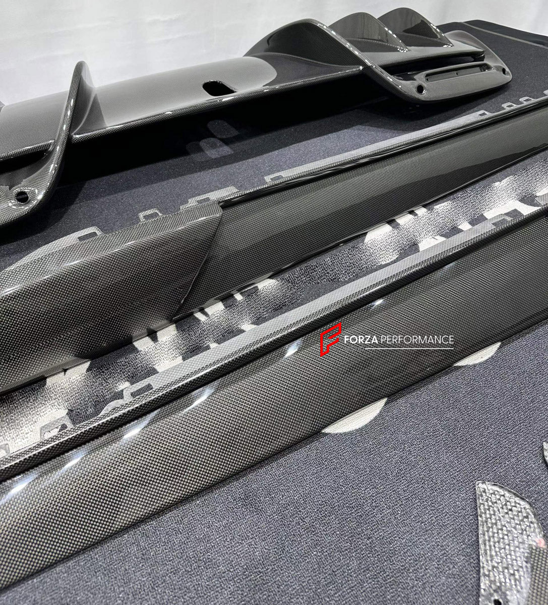 DRY CARBON BODY KIT for FERRARI 296 GTB GTS 2022+

Set includes:
Front Lip Splitter
Side Skirts
Rear Diffuser

Material: Dry Carbon

NOTE: Professional installation is required.