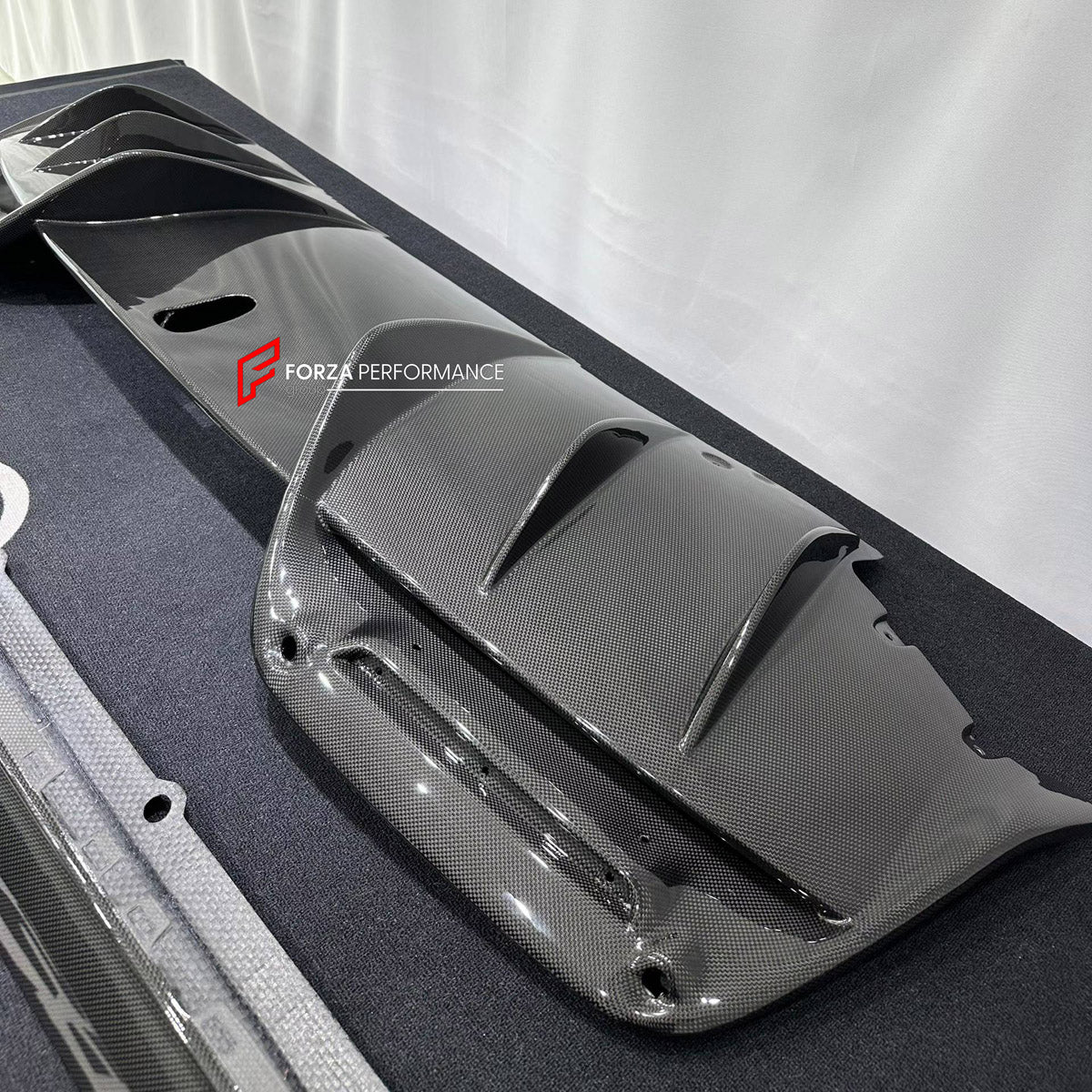 DRY CARBON BODY KIT for FERRARI 296 GTB GTS 2022+

Set includes:
Front Lip Splitter
Side Skirts
Rear Diffuser

Material: Dry Carbon

NOTE: Professional installation is required.