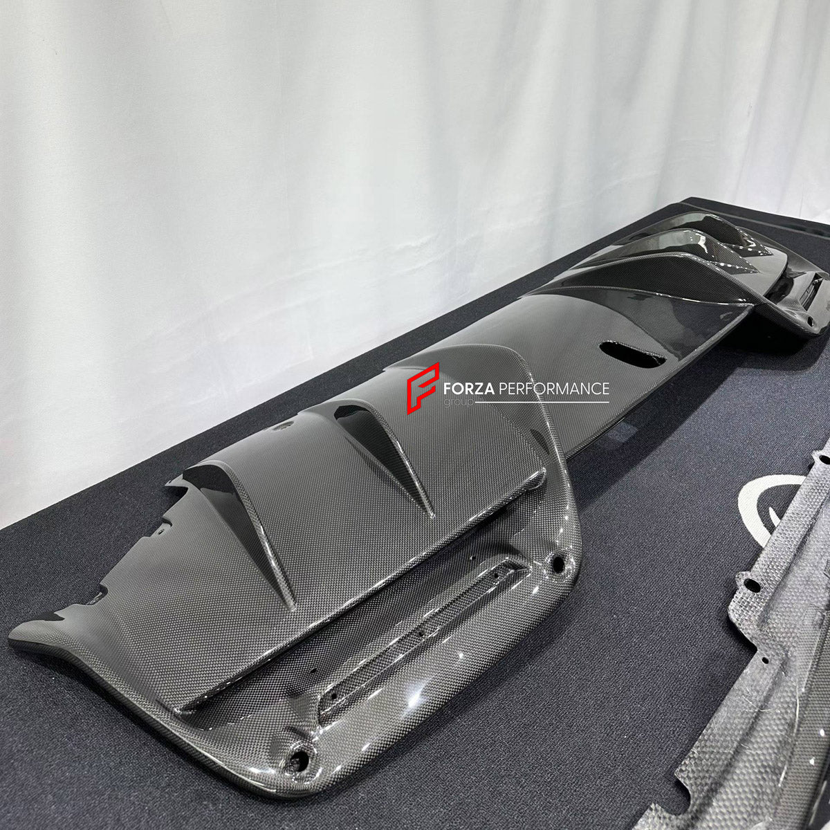 DRY CARBON BODY KIT for FERRARI 296 GTB GTS 2022+

Set includes:
Front Lip Splitter
Side Skirts
Rear Diffuser

Material: Dry Carbon

NOTE: Professional installation is required.