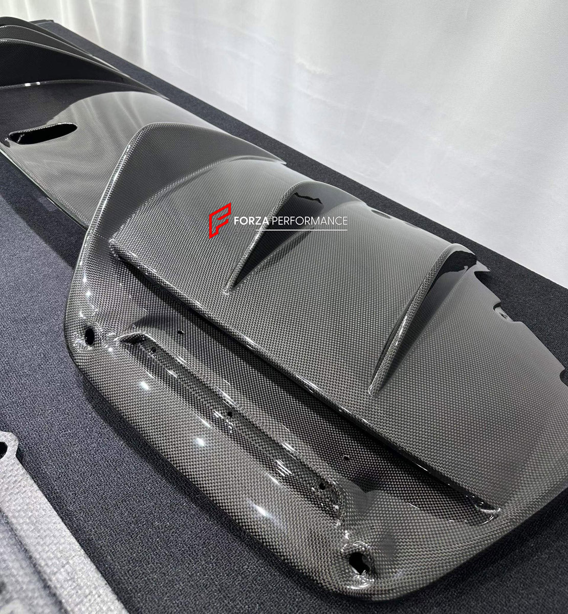 DRY CARBON BODY KIT for FERRARI 296 GTB GTS 2022+

Set includes:
Front Lip Splitter
Side Skirts
Rear Diffuser

Material: Dry Carbon

NOTE: Professional installation is required.
