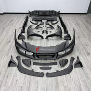 DRY CARBON BODY KIT for FERRARI 296 GTB GTS 2022+ FORZA PERFORMANCE custom fit Mansory Style

Set includes:
Front Lip
Front Bumper Assembly
Front Fenders
Side Fender Vents
Side Skirts
Rear Spoiler Wing
Rear Diffuser

Material: Dry Carbon

NOTE: Professional installation is required.