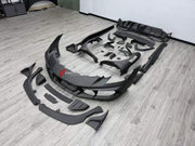 DRY CARBON BODY KIT for FERRARI 296 GTB GTS 2022+ FORZA PERFORMANCE custom fit Mansory Style

Set includes:
Front Lip
Front Bumper Assembly
Front Fenders
Side Fender Vents
Side Skirts
Rear Spoiler Wing
Rear Diffuser

Material: Dry Carbon

NOTE: Professional installation is required.