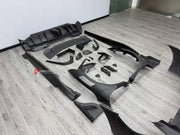 DRY CARBON BODY KIT for FERRARI 296 GTB GTS 2022+ FORZA PERFORMANCE custom fit Mansory Style

Set includes:
Front Lip
Front Bumper Assembly
Front Fenders
Side Fender Vents
Side Skirts
Rear Spoiler Wing
Rear Diffuser

Material: Dry Carbon

NOTE: Professional installation is required.