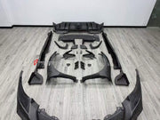 DRY CARBON BODY KIT for FERRARI 296 GTB GTS 2022+ FORZA PERFORMANCE custom fit Mansory Style

Set includes:
Front Lip
Front Bumper Assembly
Front Fenders
Side Fender Vents
Side Skirts
Rear Spoiler Wing
Rear Diffuser

Material: Dry Carbon

NOTE: Professional installation is required.