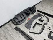 DRY CARBON BODY KIT for FERRARI 296 GTB GTS 2022+ FORZA PERFORMANCE custom fit Mansory Style

Set includes:
Front Lip
Front Bumper Assembly
Front Fenders
Side Fender Vents
Side Skirts
Rear Spoiler Wing
Rear Diffuser

Material: Dry Carbon

NOTE: Professional installation is required.