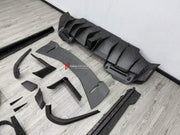 DRY CARBON BODY KIT for FERRARI 296 GTB GTS 2022+ FORZA PERFORMANCE custom fit Mansory Style

Set includes:
Front Lip
Front Bumper Assembly
Front Fenders
Side Fender Vents
Side Skirts
Rear Spoiler Wing
Rear Diffuser

Material: Dry Carbon

NOTE: Professional installation is required.