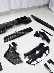 DRY CARBON BODY KIT for FERRARI 296 GTB GTS 2022+ FORZA PERFORMANCE custom fit OEM Style

Set includes:
Front Lip Splitter
Door Sills
Side Skirts
Rear Spoiler Wing
Engine Bay Trim Covers
Rear Diffuser

Material: Dry Carbon

NOTE: Professional installation is required.