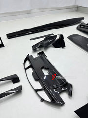 DRY CARBON BODY KIT for FERRARI 296 GTB GTS 2022+ FORZA PERFORMANCE custom fit OEM Style

Set includes:
Front Lip Splitter
Door Sills
Side Skirts
Rear Spoiler Wing
Engine Bay Trim Covers
Rear Diffuser

Material: Dry Carbon

NOTE: Professional installation is required.