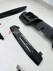 DRY CARBON BODY KIT for FERRARI 296 GTB GTS 2022+ FORZA PERFORMANCE custom fit OEM Style

Set includes:
Front Lip Splitter
Door Sills
Side Skirts
Rear Spoiler Wing
Engine Bay Trim Covers
Rear Diffuser

Material: Dry Carbon

NOTE: Professional installation is required.