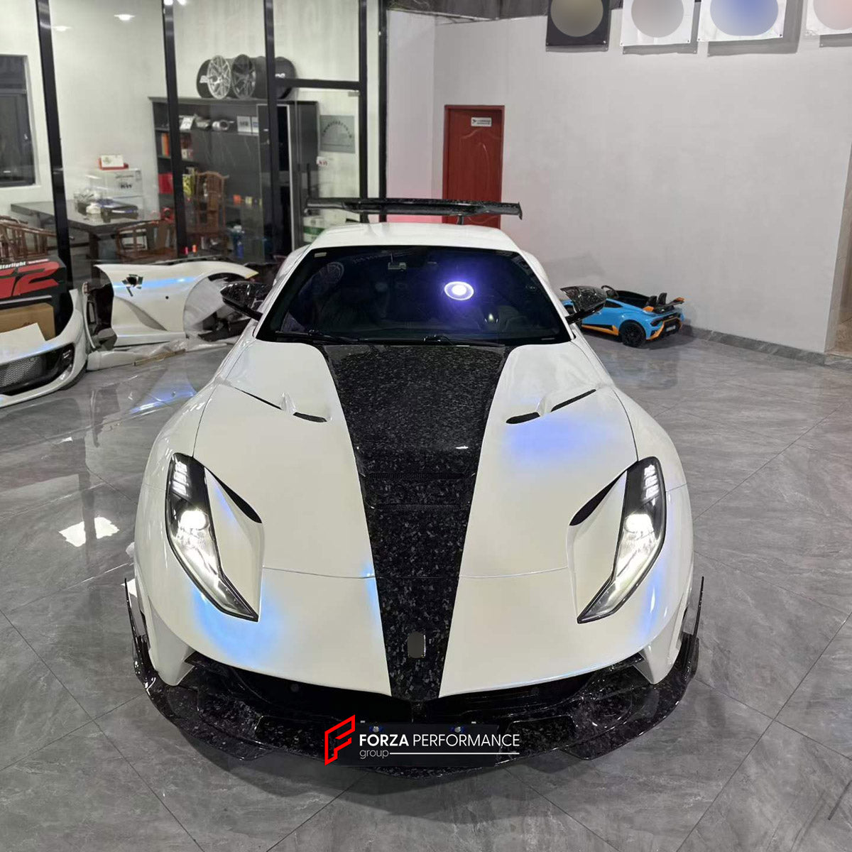 DRY CARBON BODY KIT for FERRARI 812 SUPERFAST GTS 2017 - 2023 FORZA PERFORMANCE custom fit Mansory Style

Set includes:
Front Lip
Front Bumper Assembly
Hood Bonnet
Front Fenders
Side Skirts
Rear Spoiler Wing
Rear Bumper Assembly
Rear Diffuser

Material: Dry Carbon

NOTE: Professional installation is required.