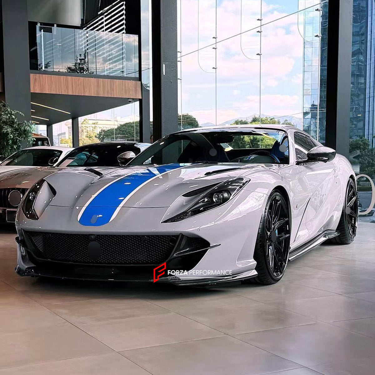 DRY CARBON BODY KIT for FERRARI 812 SUPERFAST GTS 2017 - 2023 FORZA PERFORMANCE custom fit Novitec Style

Set includes:
Front Lip
Front Bumper Air Vents
Side Skirts
Ducktail Spoiler
Rear Bumper Fins

Material: Dry Carbon

NOTE: Professional installation is required.